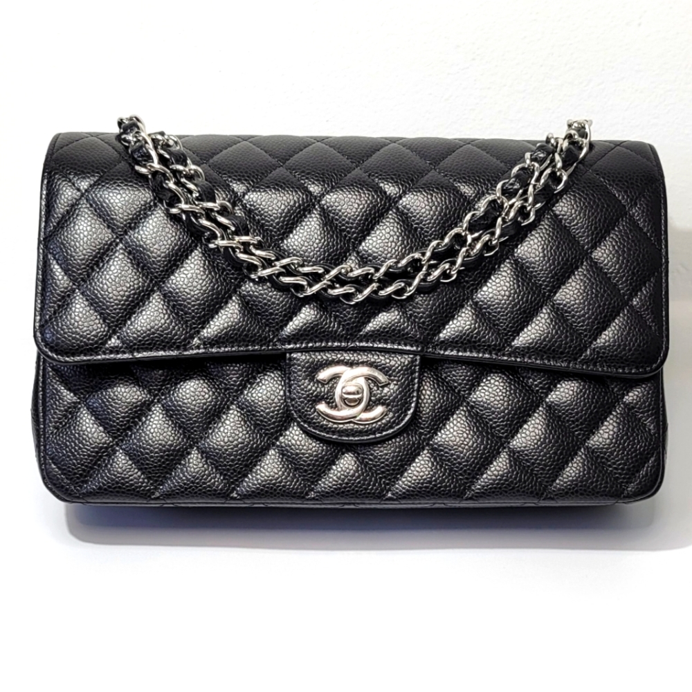 Chanel Medium Classic Flap Caviar Black Leather shoulder bag.